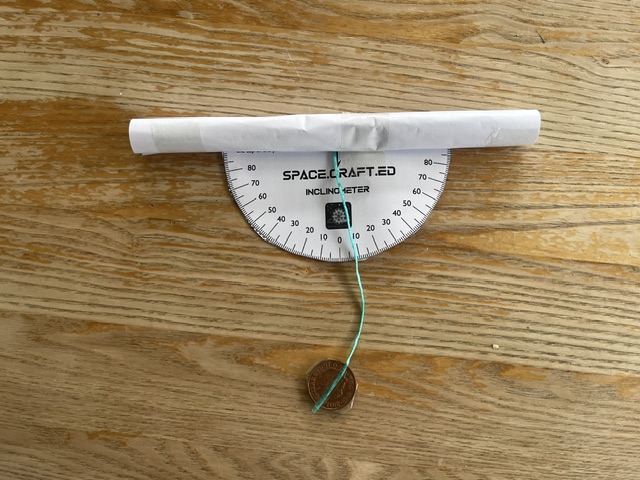 Hand-built inclinometer with protractor and plumb line