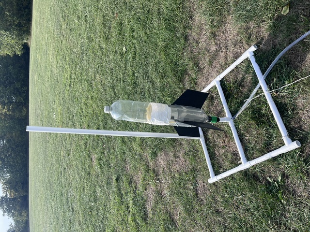Two bottle water rocket on launch base